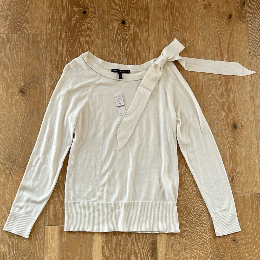 Ivory sweater with bow detail